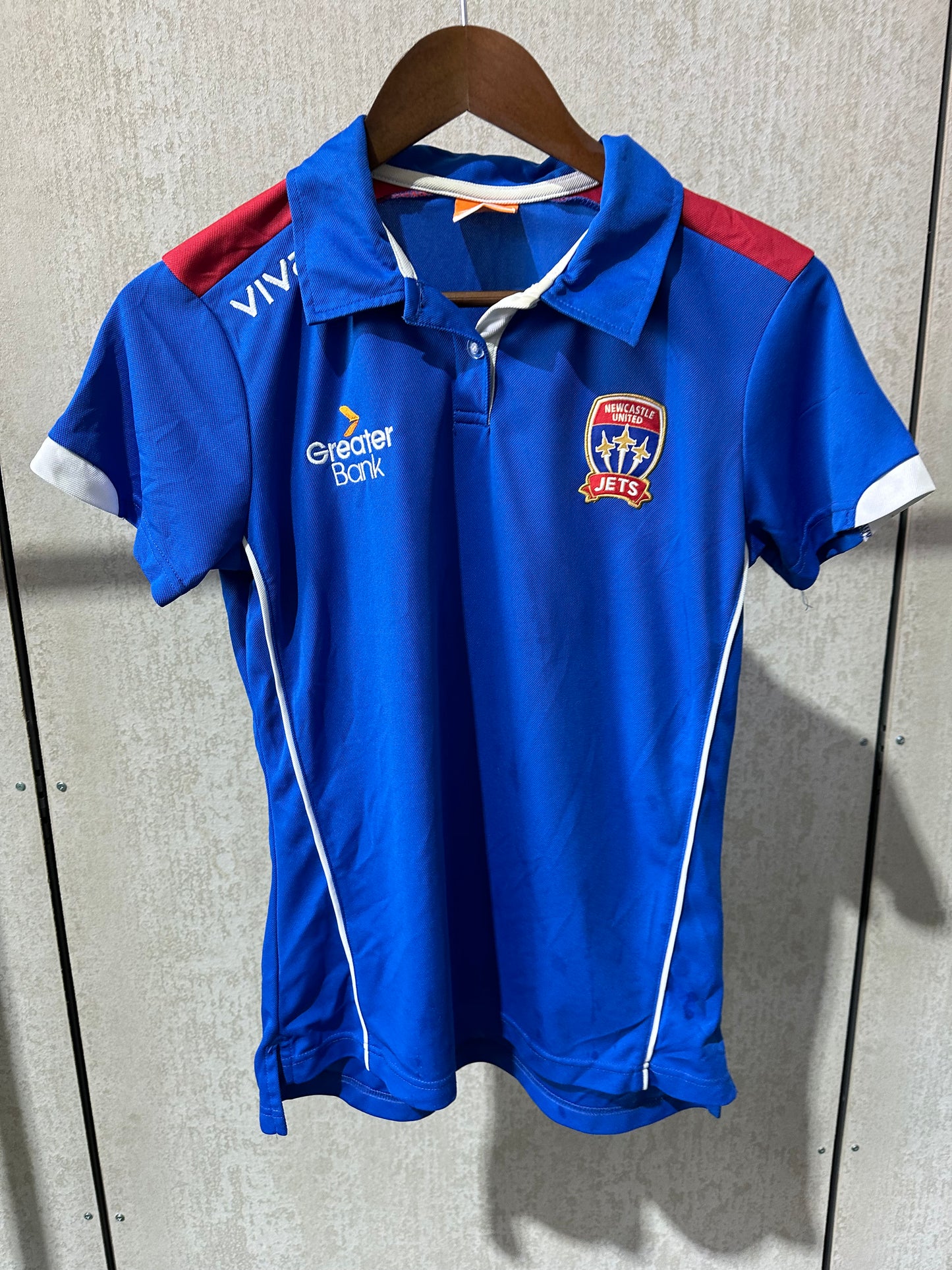 PRE LOVED NEWCASTLE JETS VIVA KIDS ACADEMY POLO